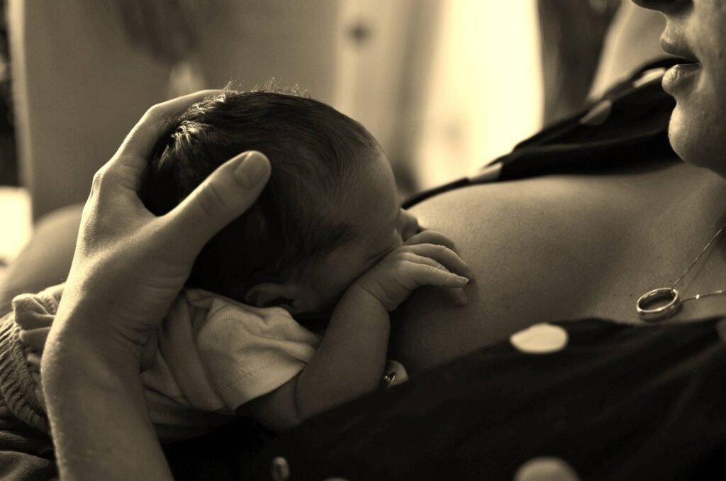 A mother breastfeeding her baby